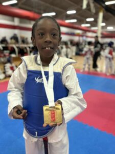 A student with a medal