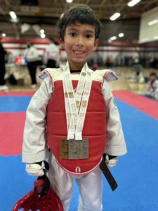 a student with a medal